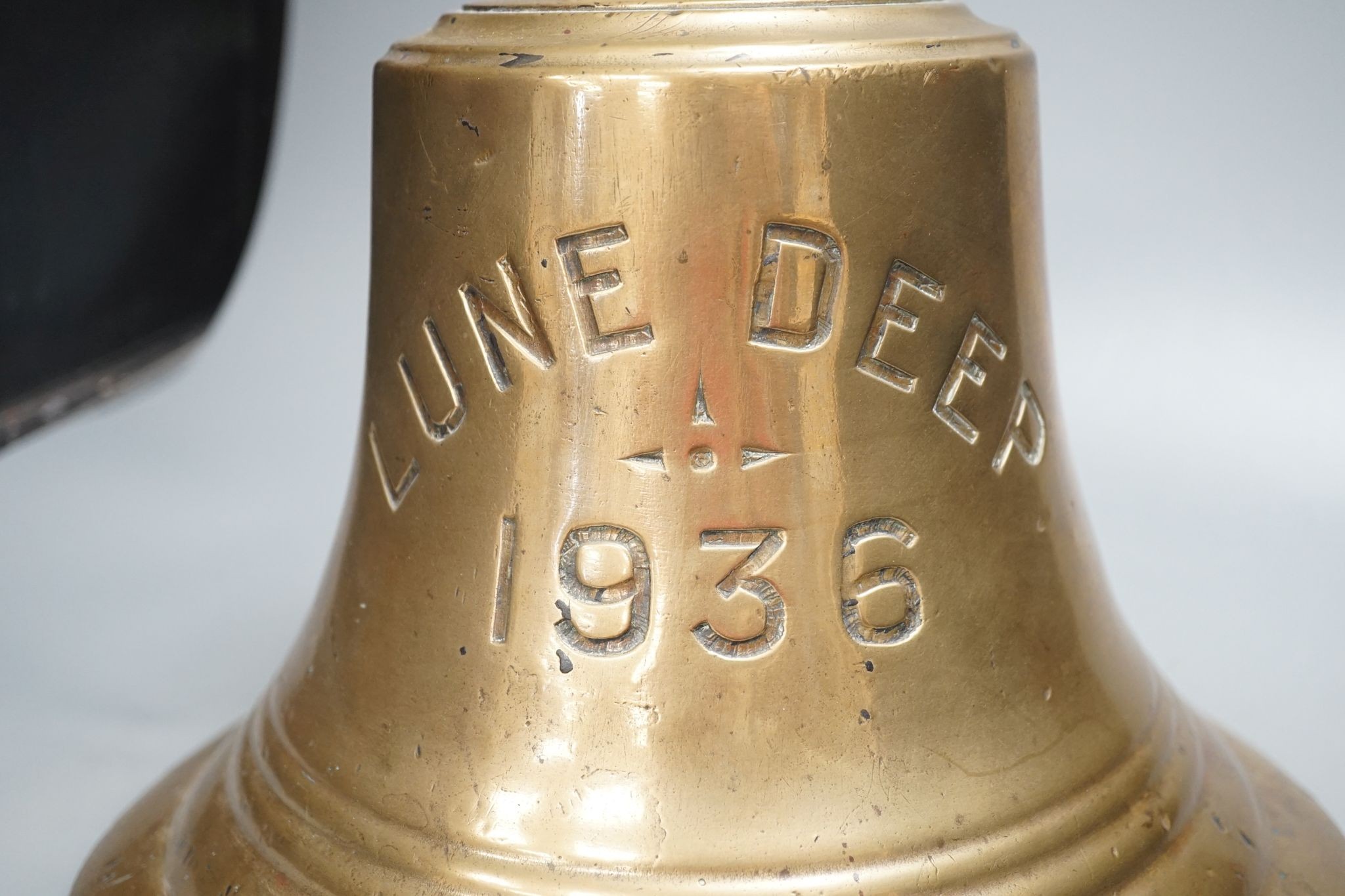 A bronze ship's bell, ‘Lune Deep 1936’, 25cm, MV `Lune Deep' O.N. 164624, was a 190ft self-propelled hopper barge built in 1936.